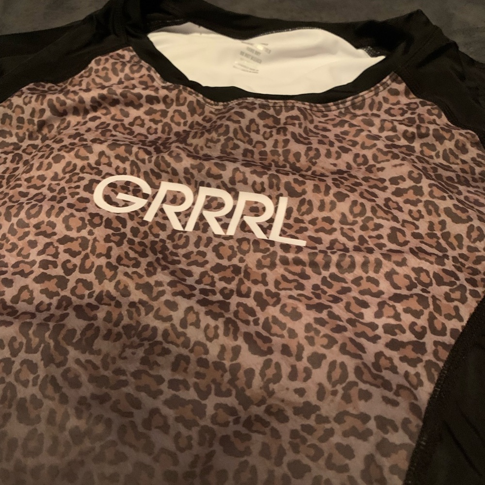 GRRRL leopard rash guard top